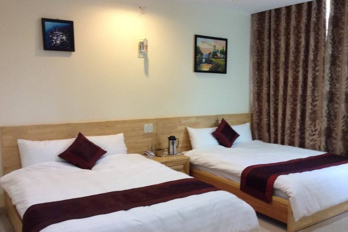 Chambre, 2 lits doubles | Minibar, bureau, Wi-Fi gratuit