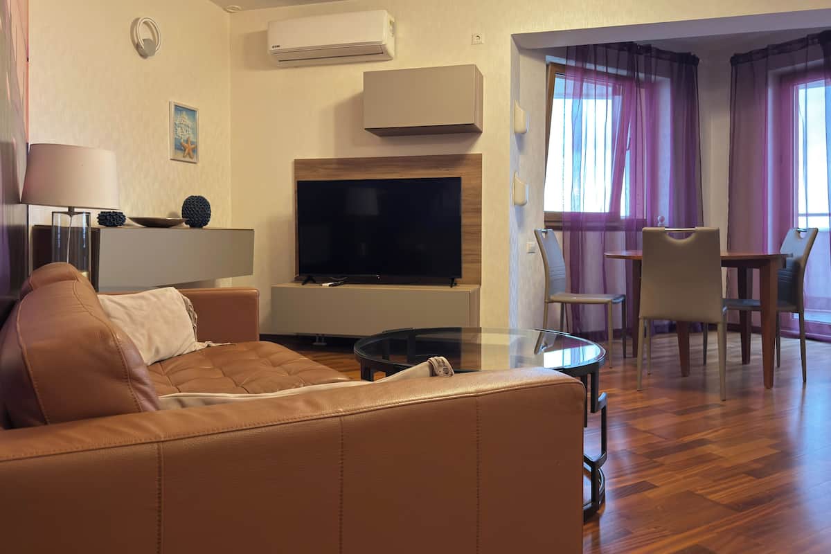 Superior-Apartment, Balkon | Wohnbereich