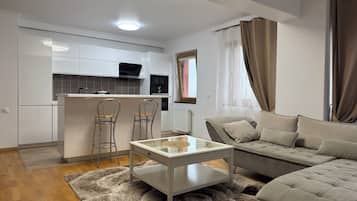 Apartment, Balcony | Living area | Flat-screen TV