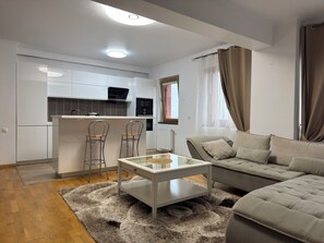 Apartment, Balcony | Living area | Flat-screen TV