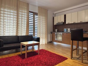 Studio, Balcony | Living area | Flat-screen TV