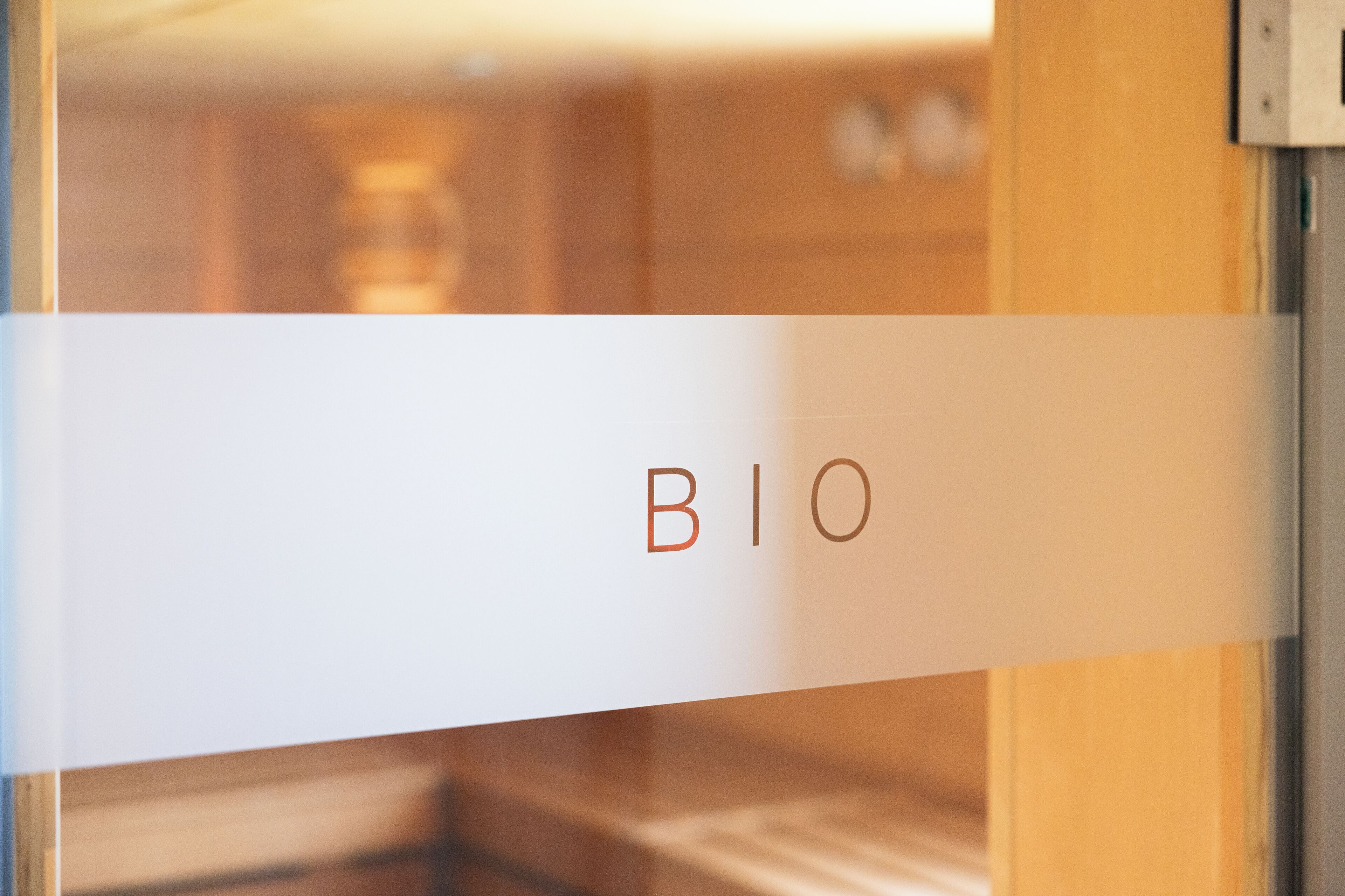 A glass door with the word "BIO" in red letters.