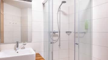 Shower, eco-friendly toiletries, hair dryer, towels