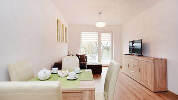 Apartment (Solny 11/B/404) | Living area | Flat-screen TV