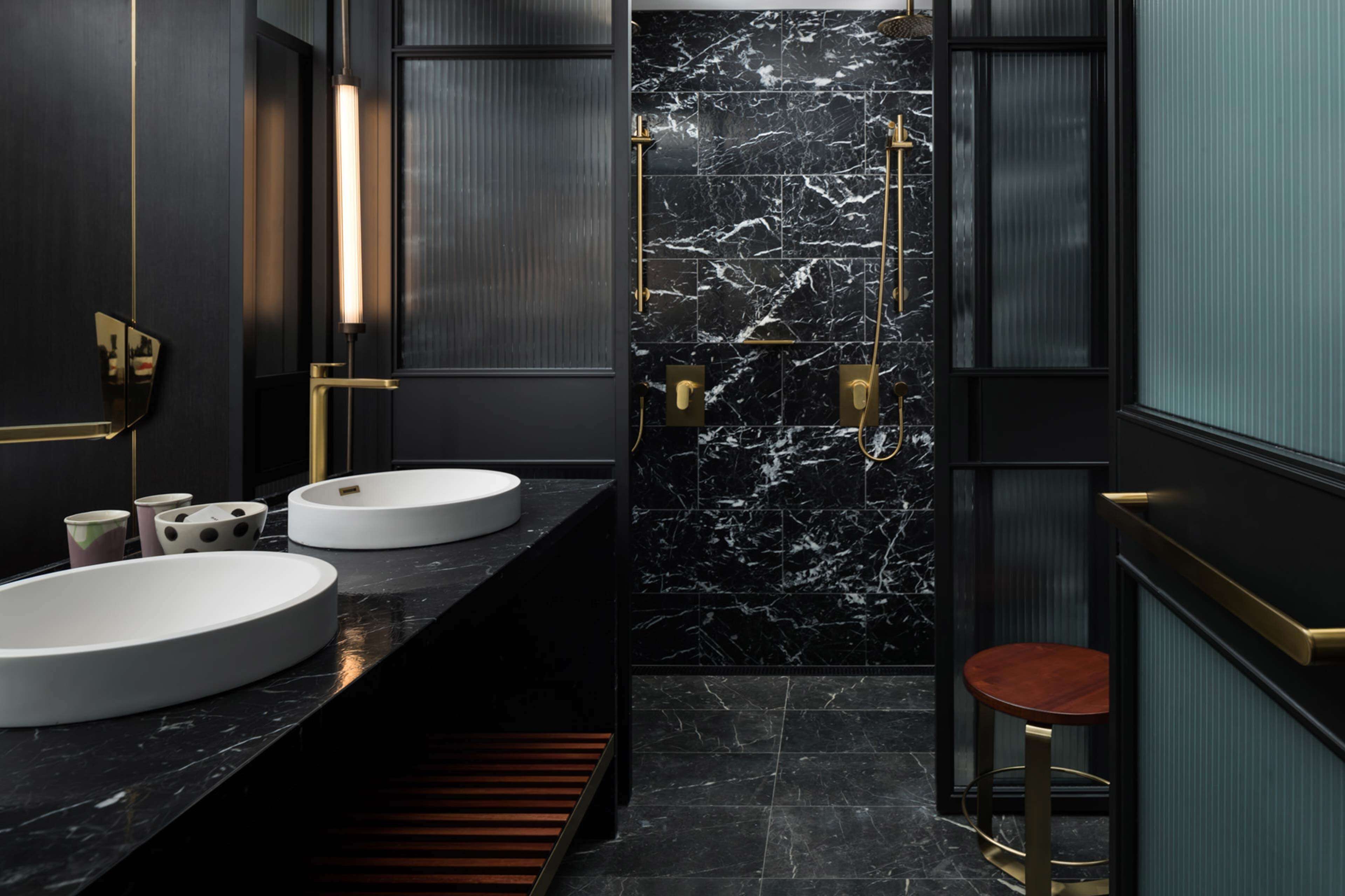 designer toiletries, hair dryer, bathrobes, slippers