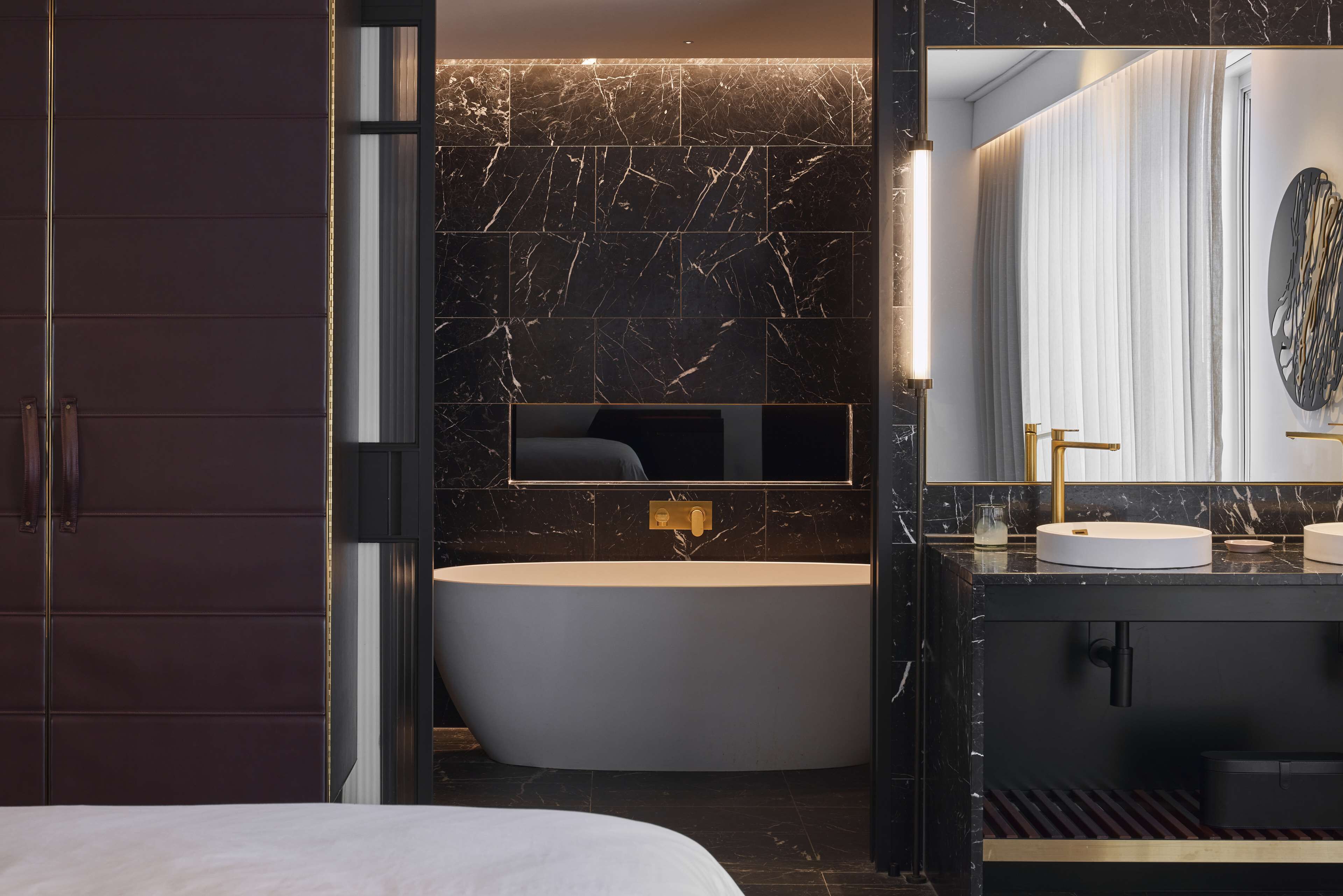 Designer toiletries, hair dryer, bathrobes, slippers