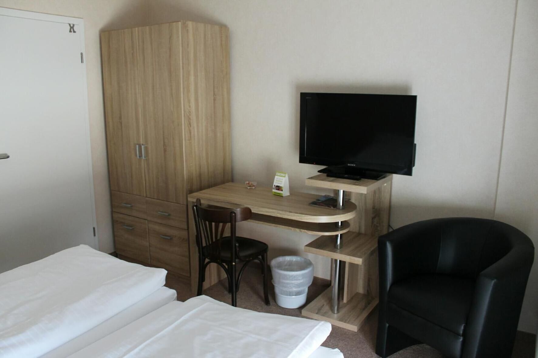 Minibar, desk, blackout drapes, iron/ironing board