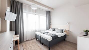 Business Twin Room | Blackout drapes, iron/ironing board, free WiFi, bed sheets