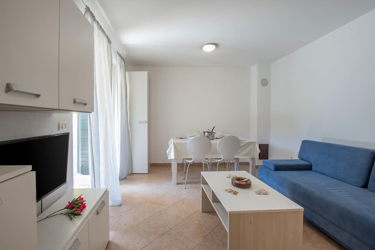 Apartamento standard, 1 quarto | 1 quarto, escrivaninha, espaço de trabalho para notebook
