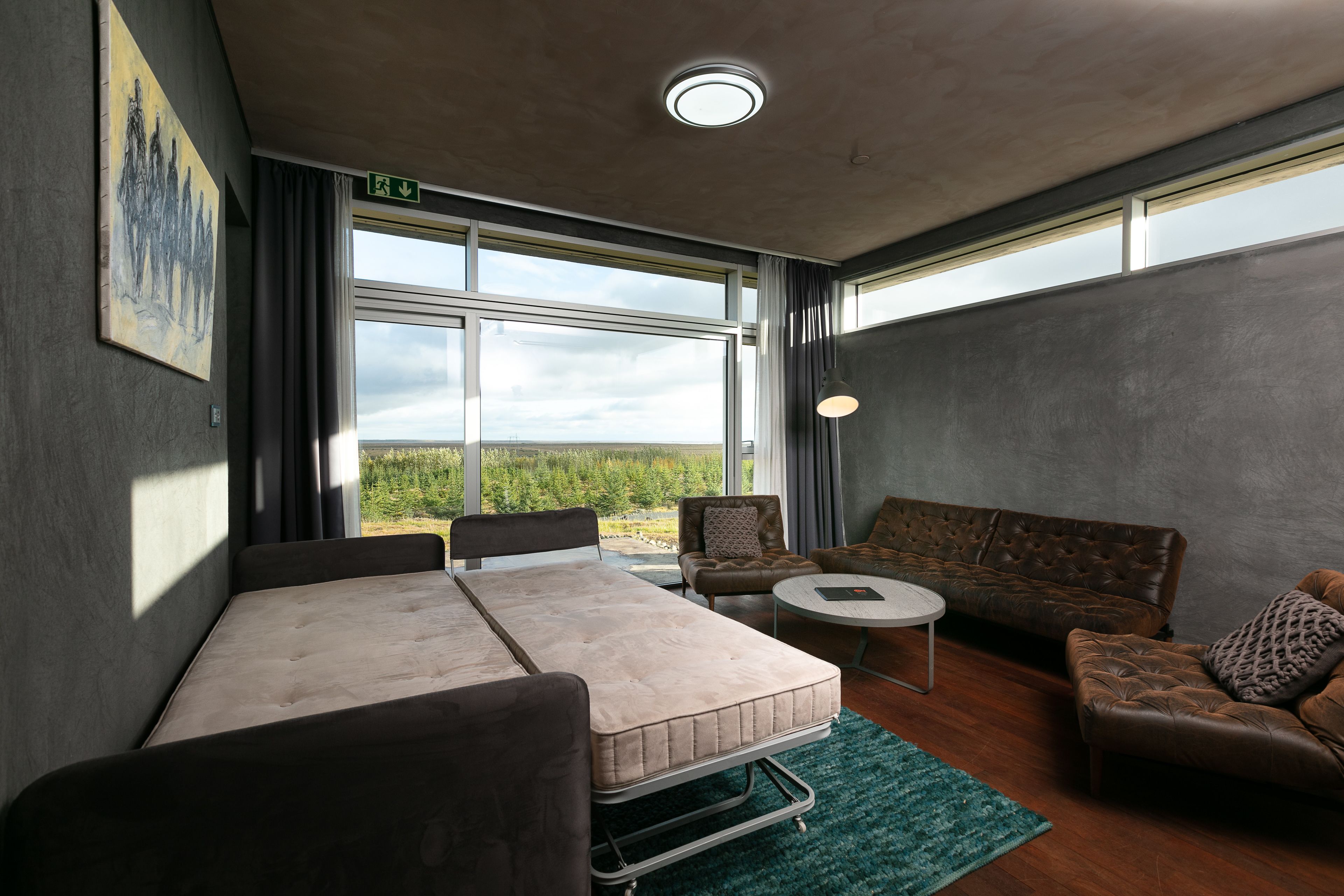 panoramic suite, accessible, sea view | minibar, in-room safe, individually decorated, desk