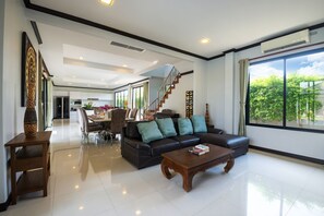 4-Bedroom Luxury Pool Villa  | Living area | 55-inch flat-screen TV with cable channels, TV - Grand Villa Luxury Holidays Phuket (Choeng Thale)