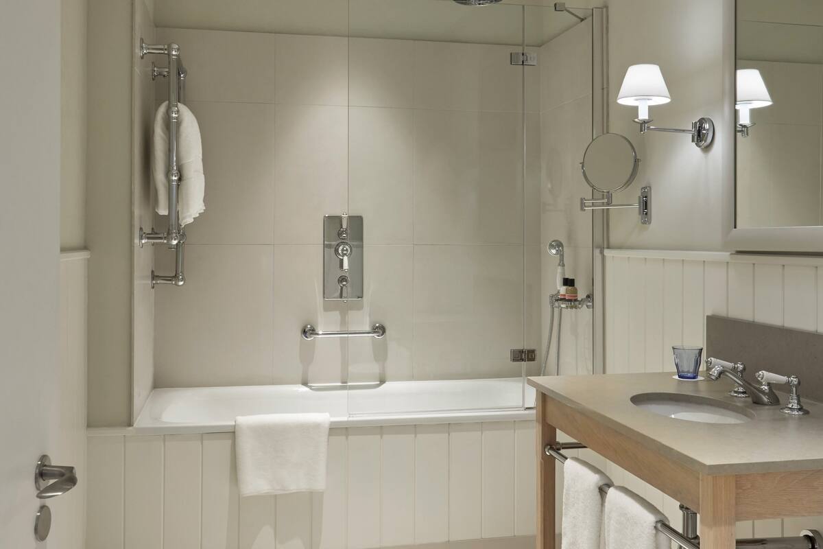 deep-soaking bathtub, free toiletries, hair dryer, bathrobes