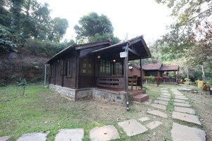 Deluxe Cottage | 1 quarto, cofres nos quartos, individualmente mobiliados