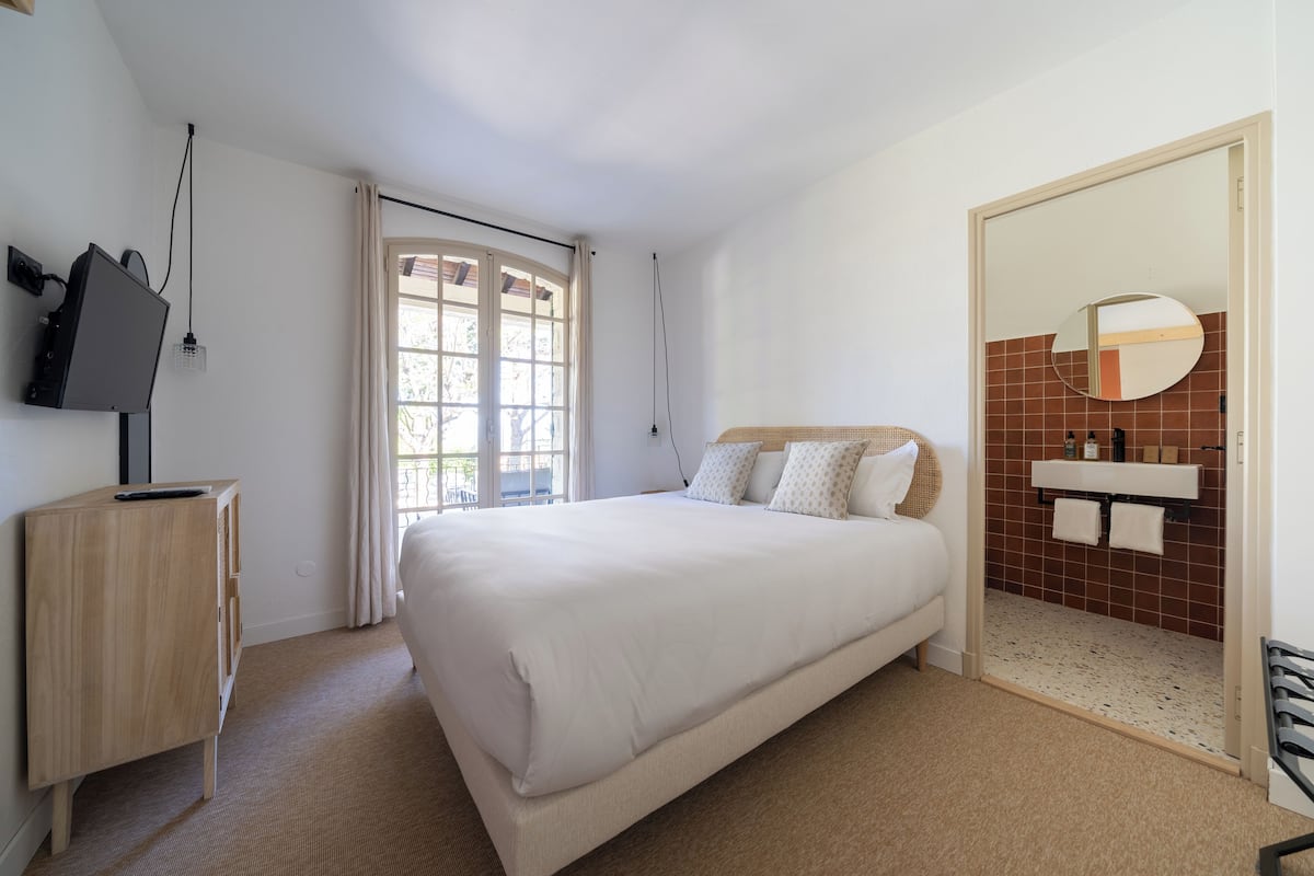 Premium bedding, memory-foam beds, desk, blackout curtains