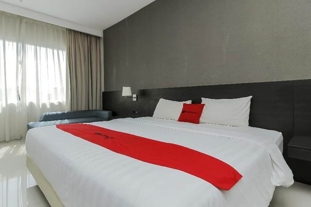 Habitación Premium | Escritorio y ropa de cama