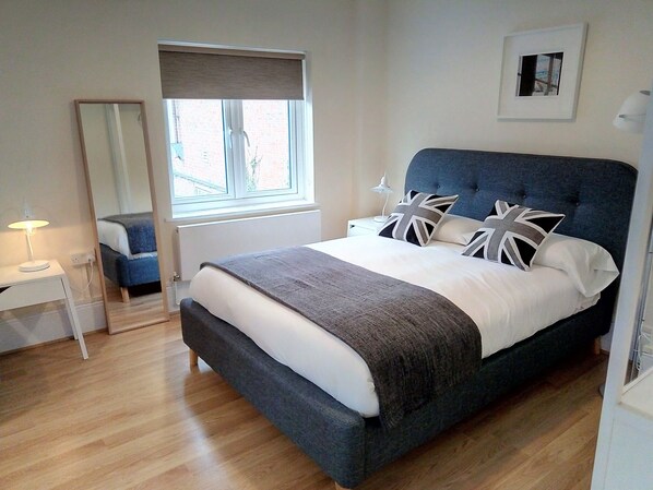 1 bedroom, desk, laptop workspace, iron/ironing board