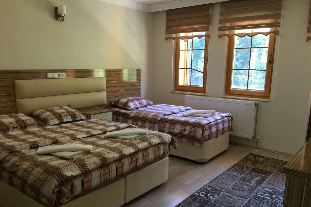 Family Room, 3 Bedrooms | Iron/ironing board, WiFi (free)