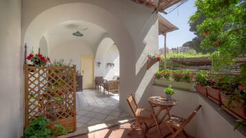 Deluxe Triple Room | Terrace/patio