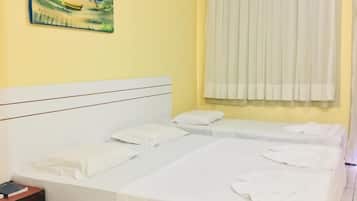 Frigobar, cortinas blackout, Wi-Fi de cortesia, roupa de cama