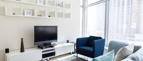 Design Apartment, 1 King Bed, City View, Sea Facing | Living area | Flat-screen TV