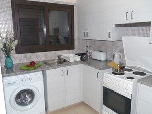 Apartment | Eigene Küche | Kühlschrank, Mikrowelle, Ofen, Hochstuhl