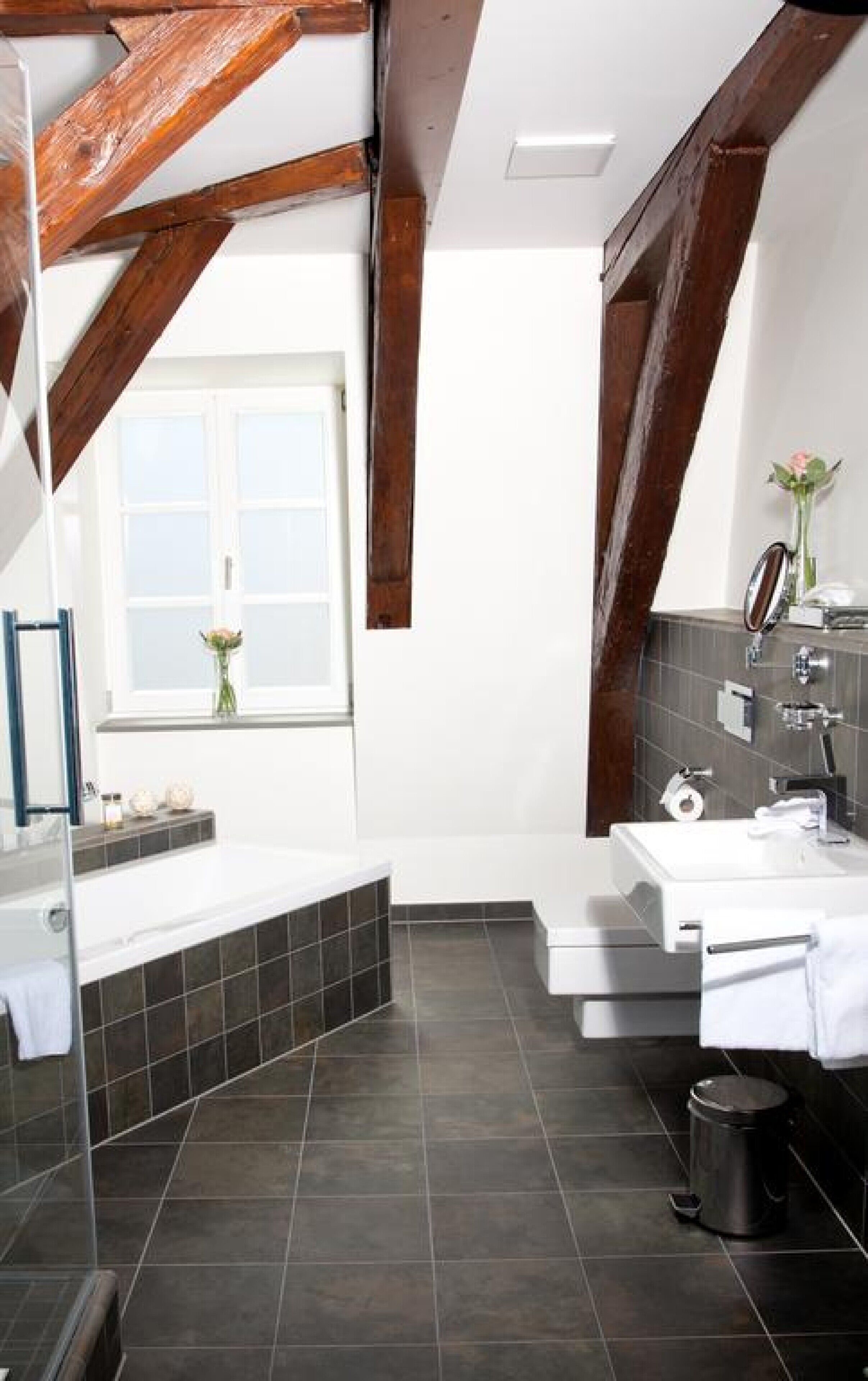 junior suite | bathroom | deep-soaking bathtub, free toiletries, hair dryer, bathrobes