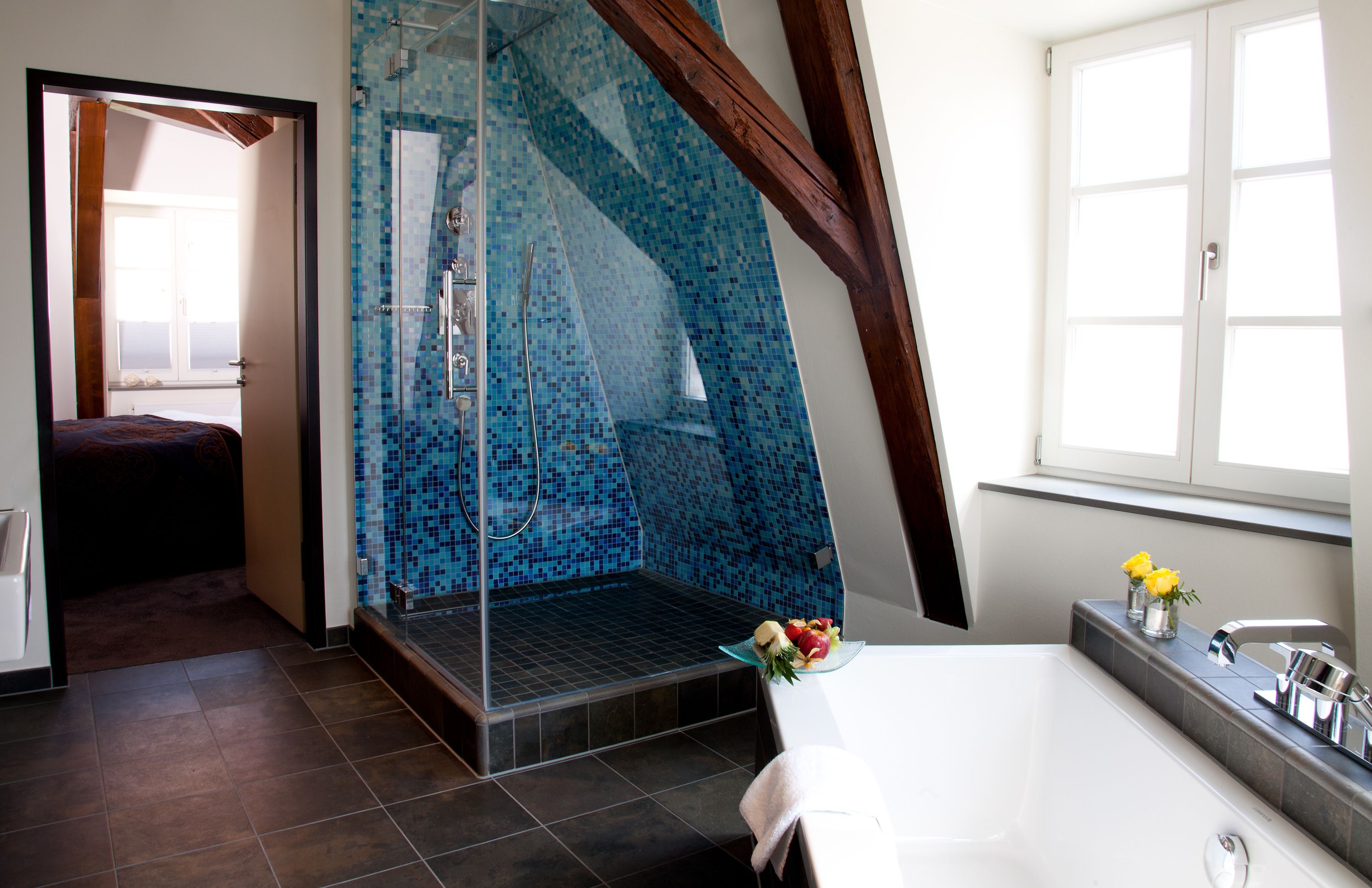 junior suite | bathroom | deep-soaking bathtub, free toiletries, hair dryer, bathrobes