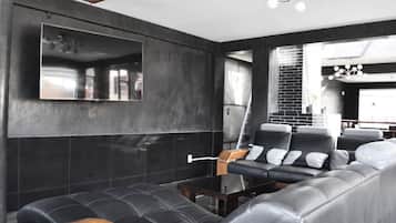 32-inch flat-screen TV with cable channels, TV