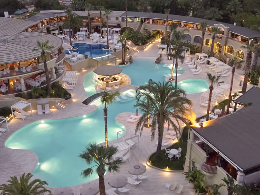 Seasonal outdoor pool, open 9:00 AM to 6:00 PM, pool umbrellas