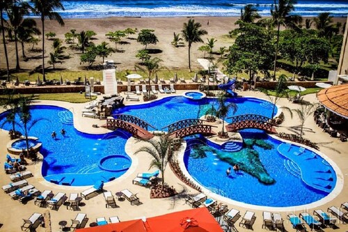 Luxe Beachfront Living/ Huge Terrace/  Resort Pool/ Concierge Services/ Grill