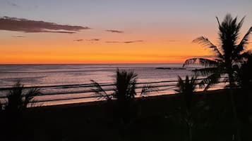 On the beach, sun loungers, beach towels