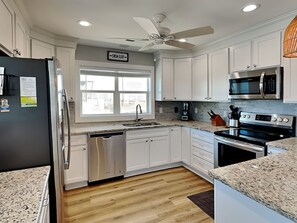 Fridge, microwave, oven, stovetop - Sea Paradise Cottage | Oceanfront + Sun Deck (Topsail Beach)