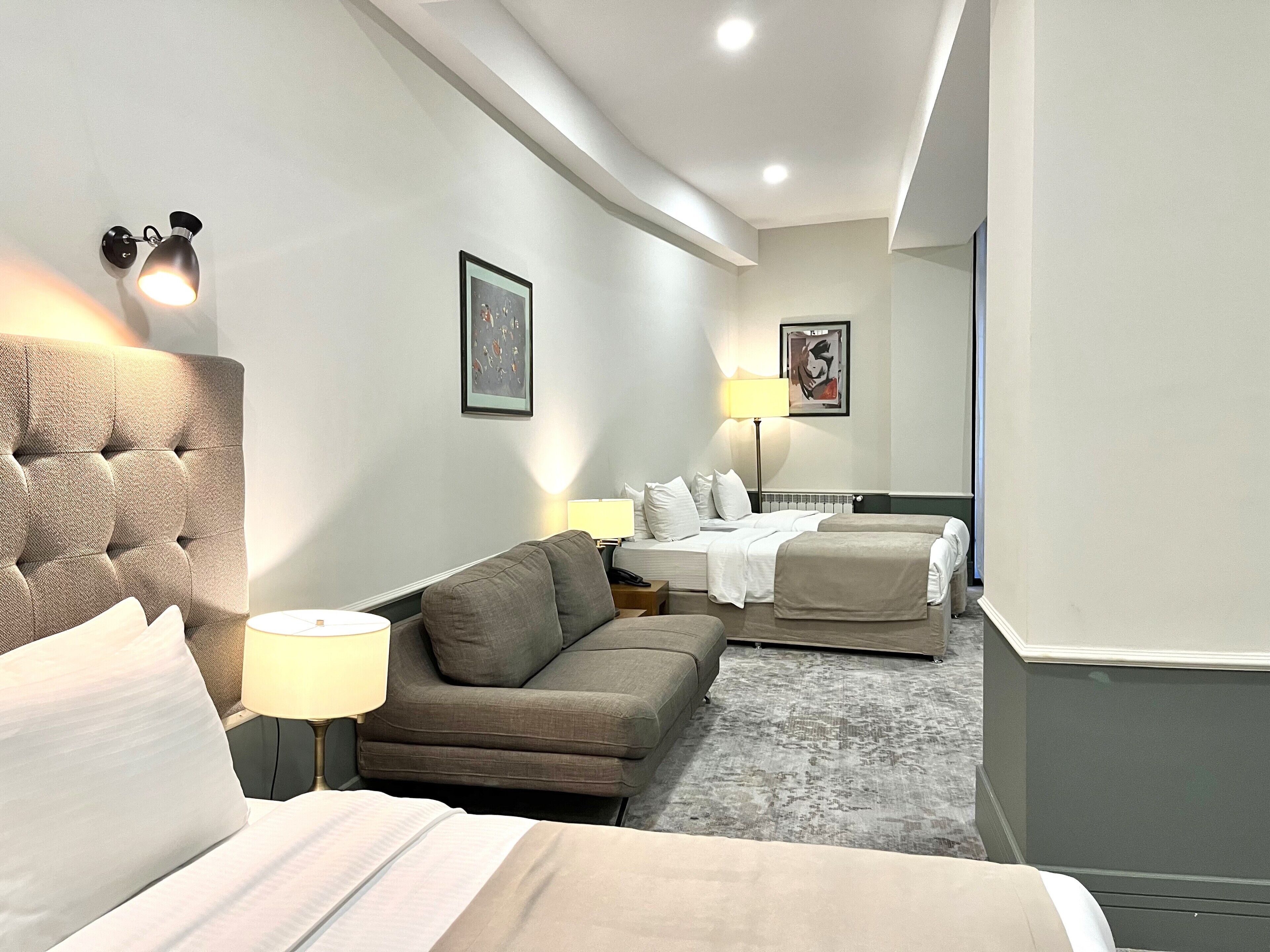 family quadruple room | premium bedding, in-room safe, desk, laptop workspace