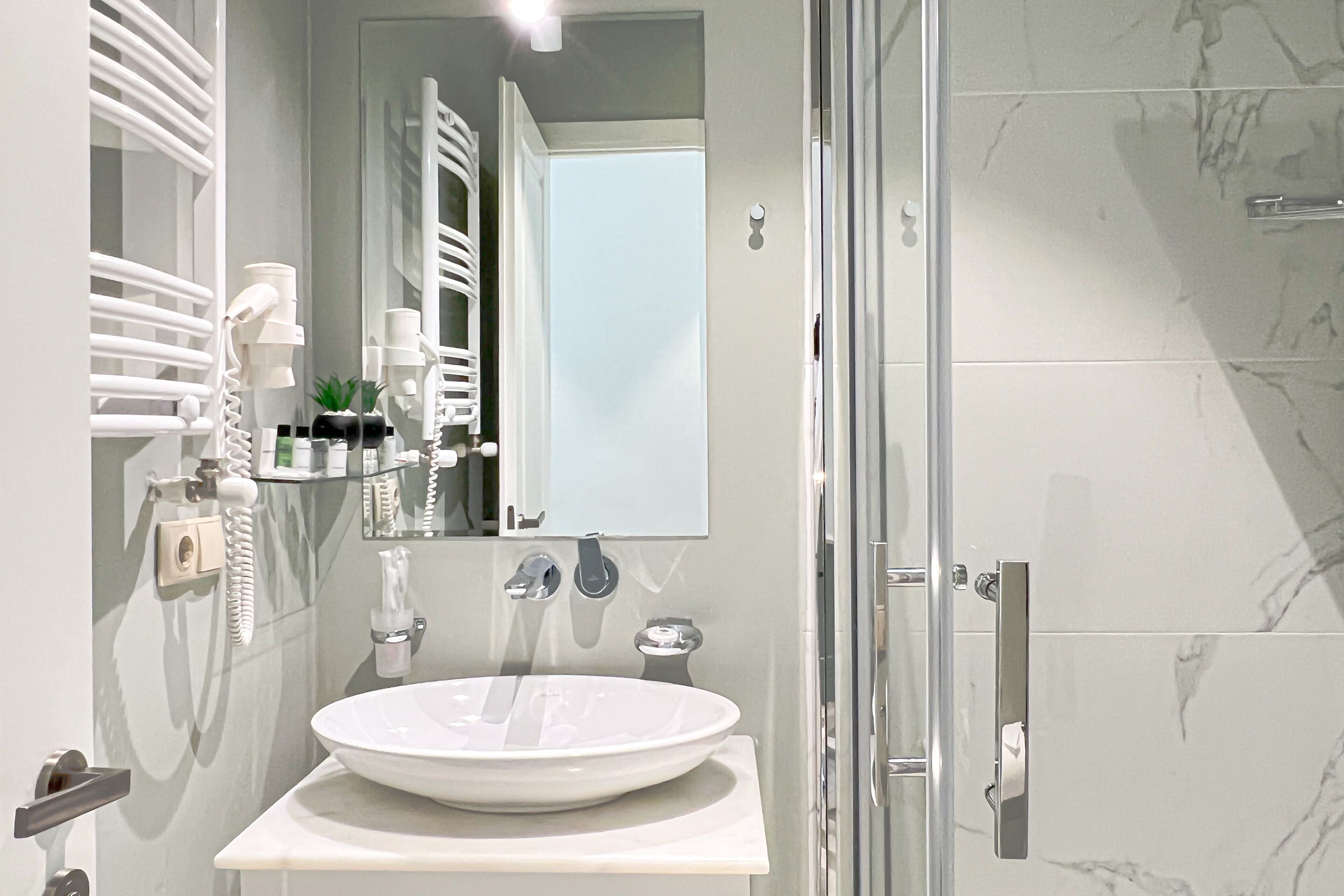 superior twin room | bathroom | free toiletries, hair dryer, bathrobes, slippers