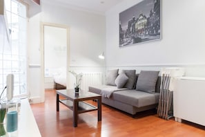Apartment, 1 Bedroom | Living room | Flat-screen TV
