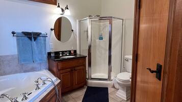 Shower, jetted tub, hair dryer, towels