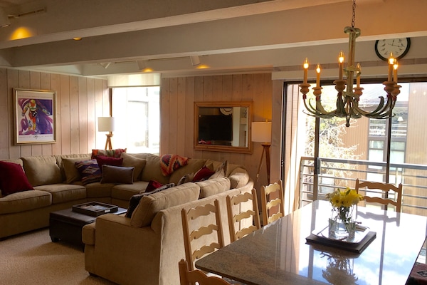 Dining Room boasts a large, marble table seating 10 and a balcony with a view.
