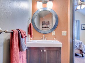 Combined shower/bathtub, hair dryer, towels, soap