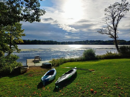 Riverfront cabin with kayaks and canoes