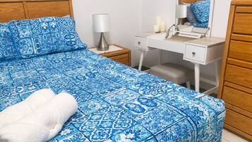 1 bedroom, desk, iron/ironing board, travel cot