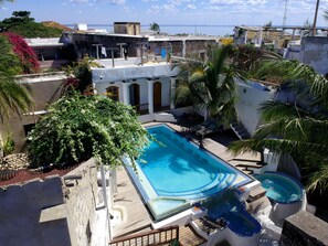 Outdoor pool, pool loungers - Cafe Central (Mozambique Island)