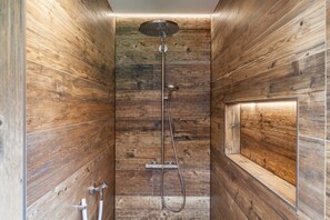 Shower, rainfall showerhead, hair dryer, towels