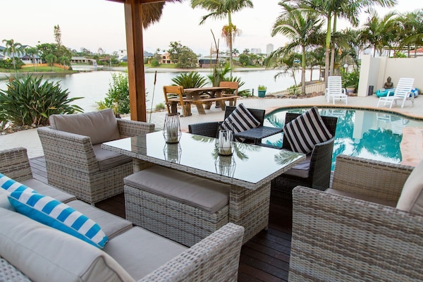 Relax under the Bali Hut blissfully gaze across the pool and north facing water.