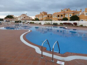 Access to nearby large communal pool 