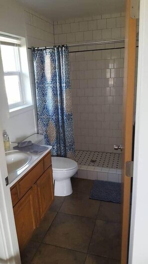 Hair dryer, towels, soap, toilet paper