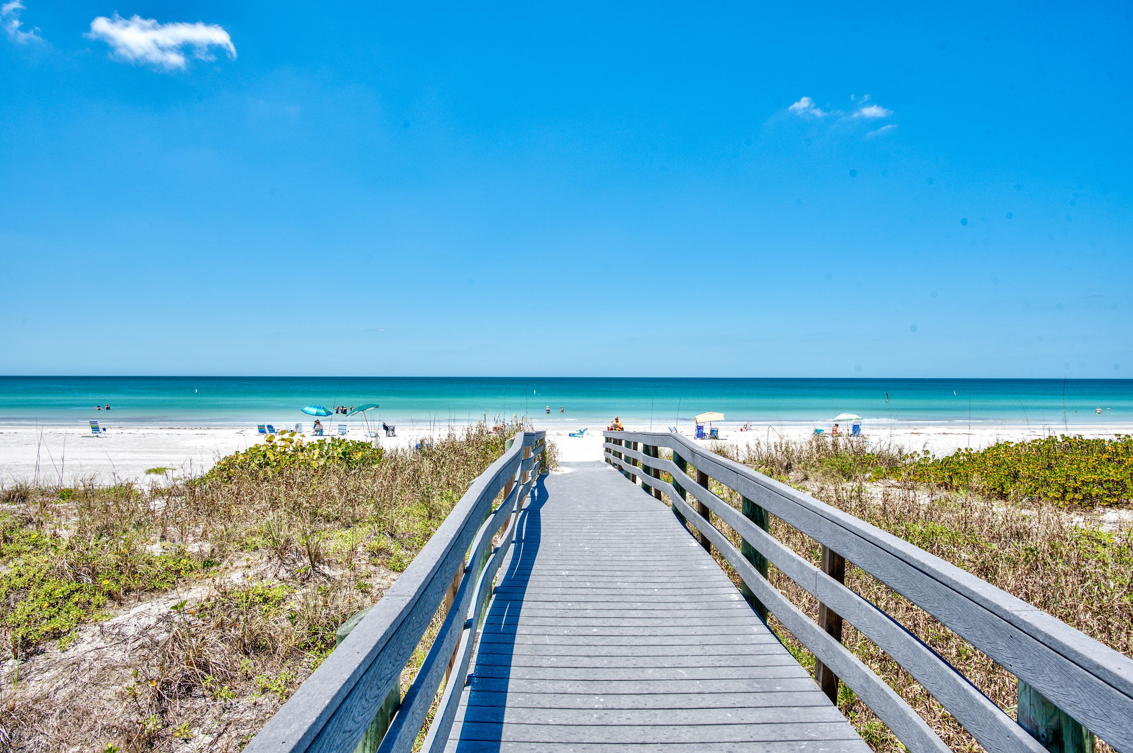 On the beach, sun loungers, beach towels