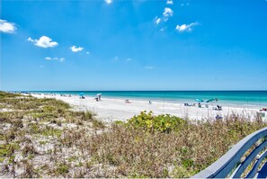 On the beach, sun-loungers, beach towels