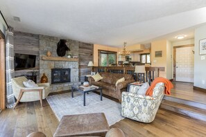 Smart TV, fireplace, books