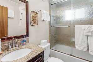 Bathtub, hair dryer, towels