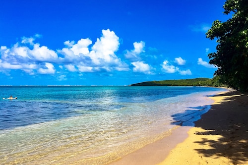 "Comfortable, modernized 5BR 4BA Home with an amazing Ocean View and breeze!